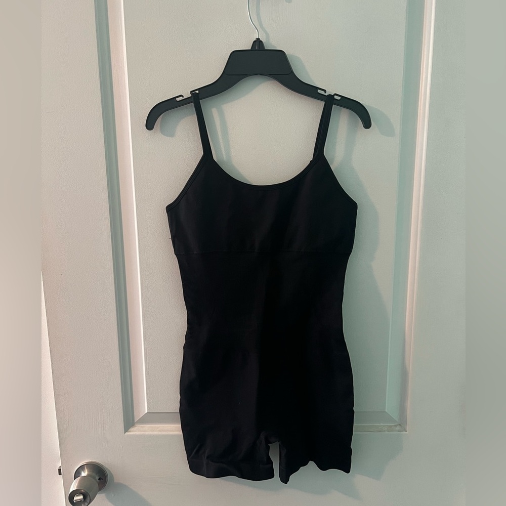 Brand new black shapewear in medium